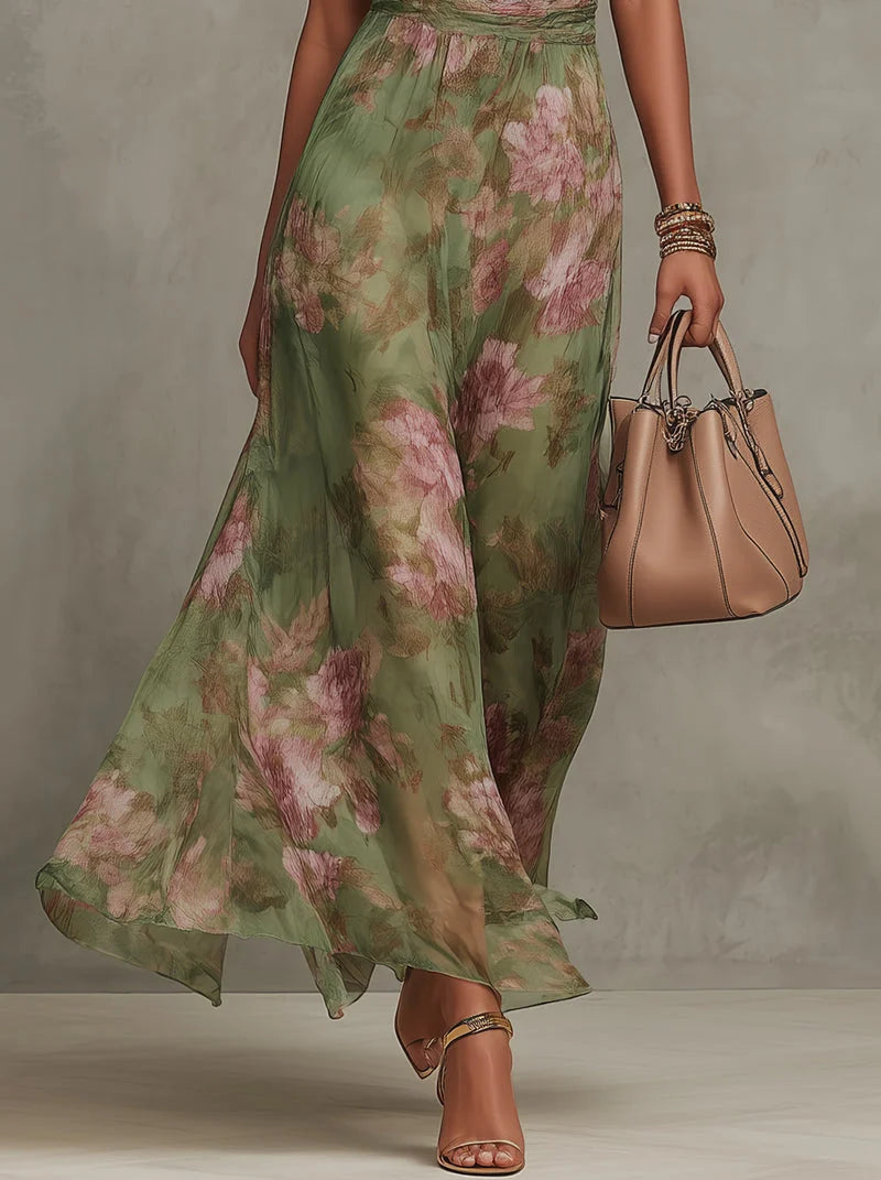 Back view of halter neck maxi dress showing adjustable tie closure and flowing drape