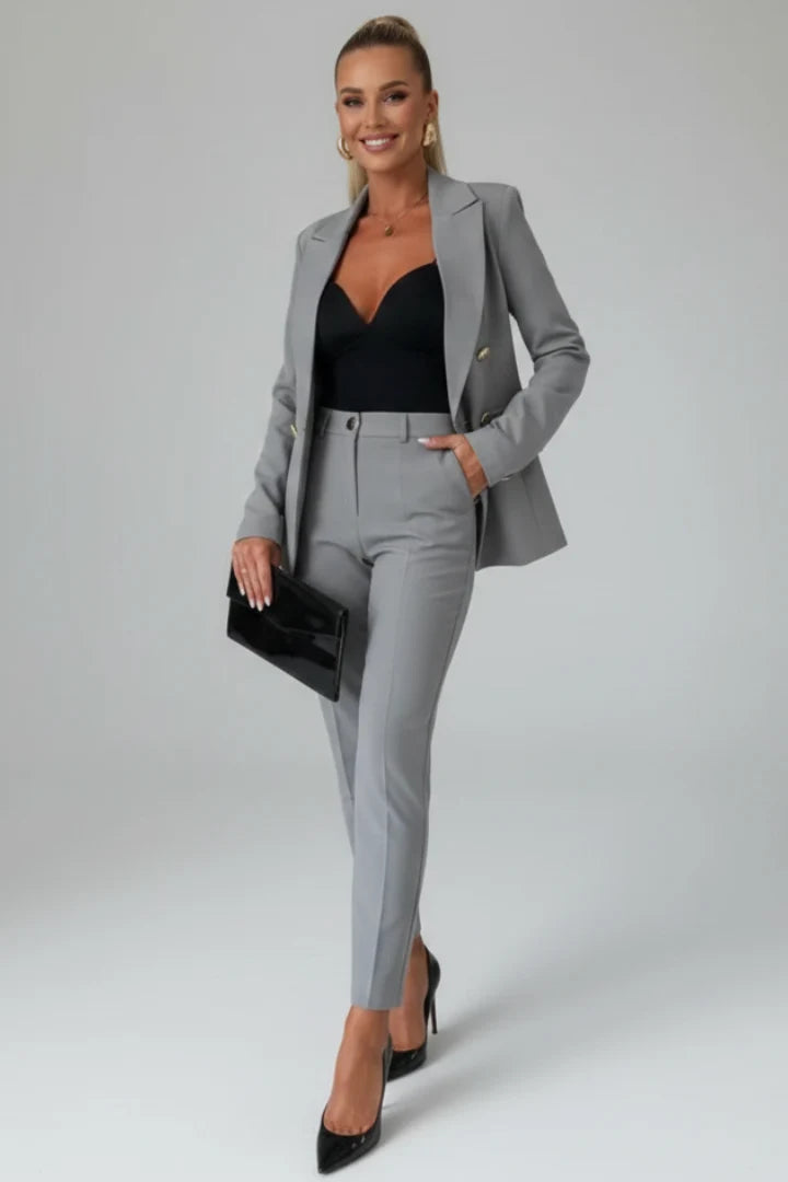Women's tailored suit set in light blue showing professional two-piece ensemble for office and formal wear
