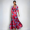 Floral maxi mother of the bride dress with V-neck wrap silhouette and three-quarter sleeves in bold poppy print