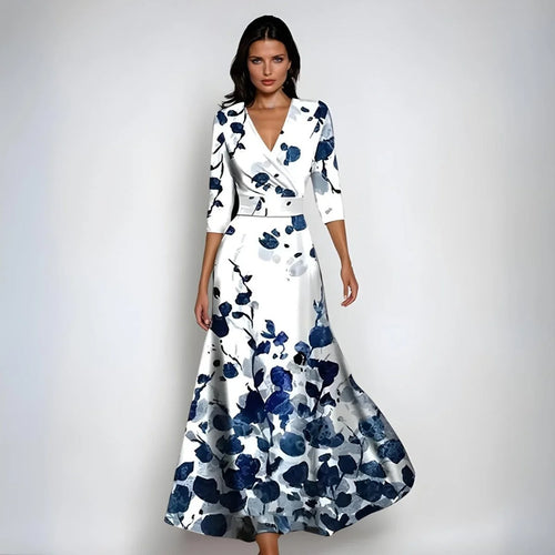 V-neck wrap bodice detail on floral maxi dress with cinched waist and A-line skirt