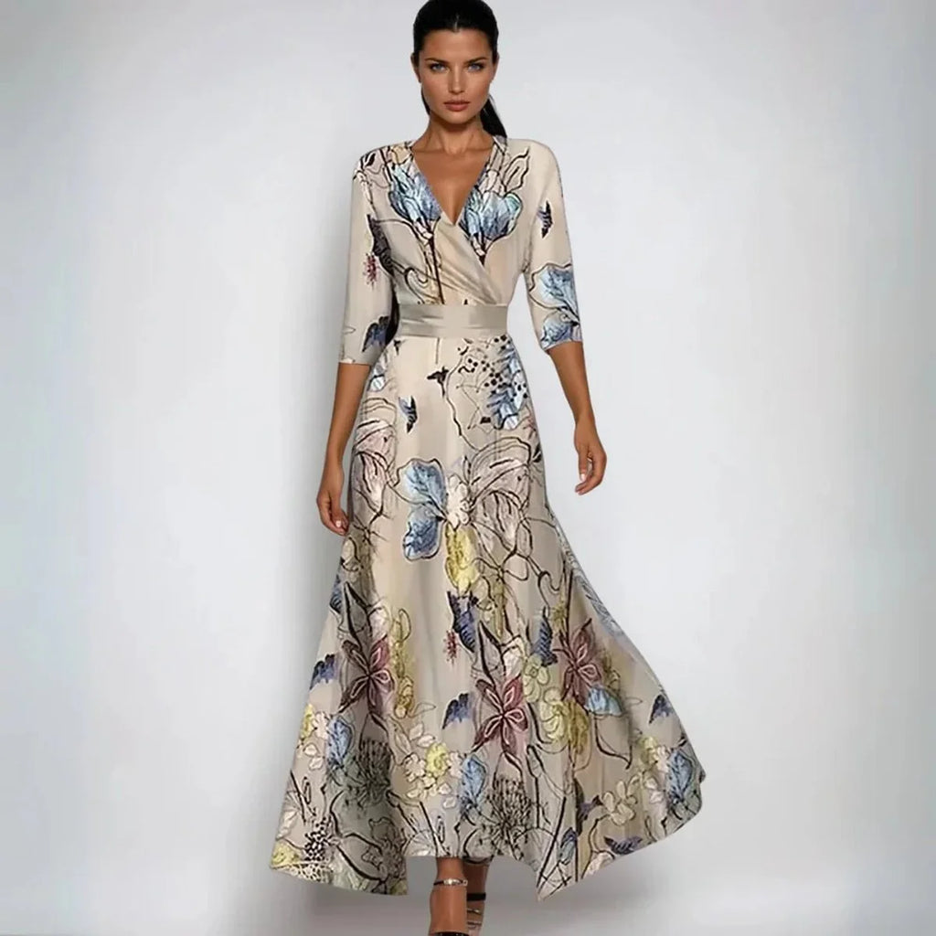 Red and blue floral print maxi dress with V-neck wrap and flowing A-line skirt