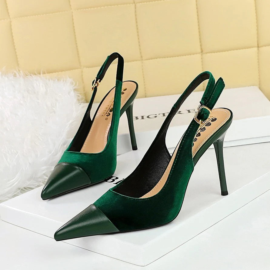 Green slingback pointed toe heels with contrast cap toe detail and adjustable ankle strap