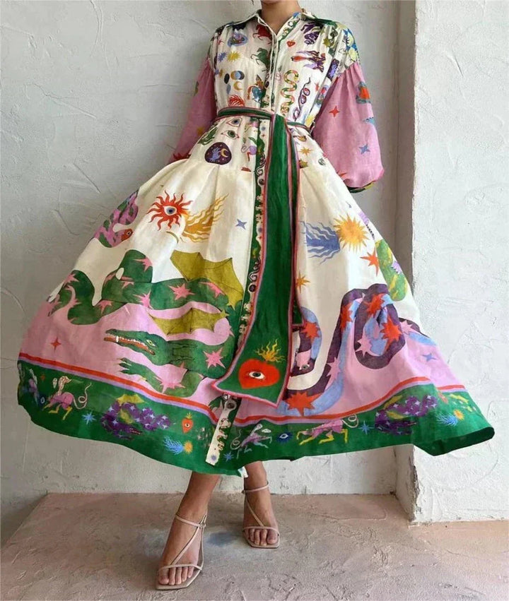 Detail shot of multicolour print and gathered balloon sleeve cuffs on maxi shirt dress