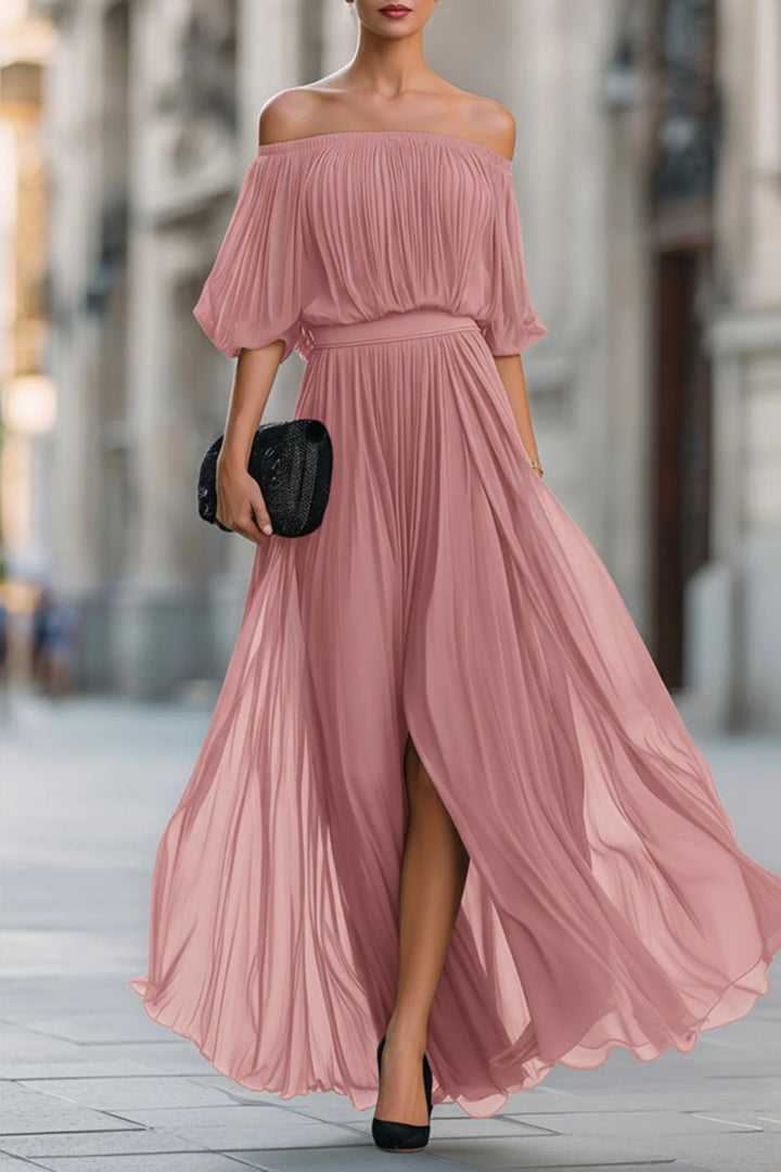 Black chiffon off-shoulder dress with flowing pleated skirt and elegant drape