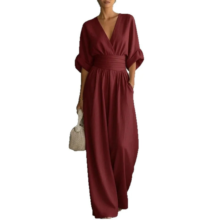 Back view of women's wide-leg linen jumpsuit showing relaxed silhouette