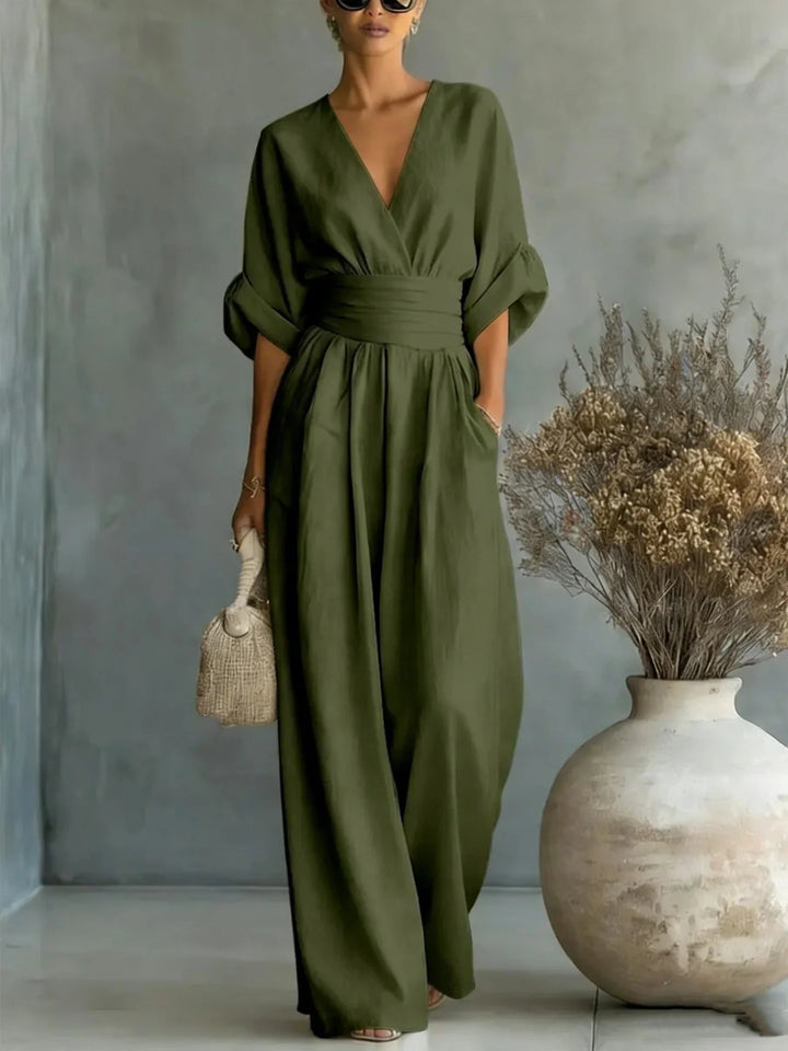 Wide-leg linen jumpsuit in olive green with 3/4 sleeves and side pockets