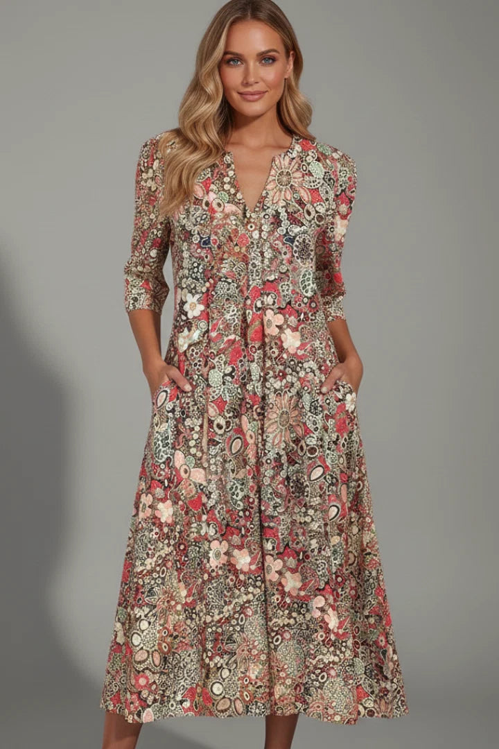 Women's printed midi dress with relaxed waist and gently flared skirt falling below knee
