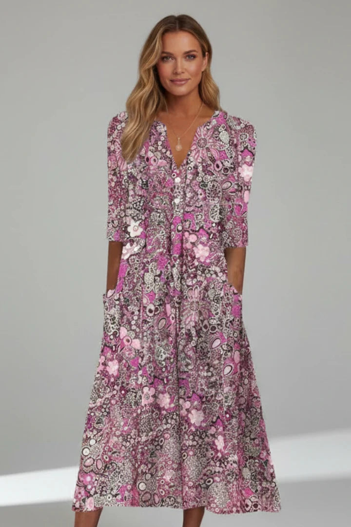 Three-quarter sleeve midi dress with all-over blue paisley print and V-neckline detail
