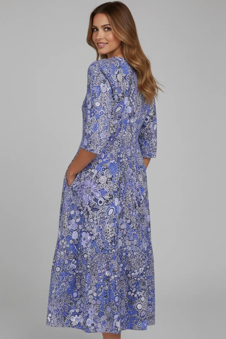 Casual midi dress with V-shaped neckline and elbow-length sleeves in printed fabric