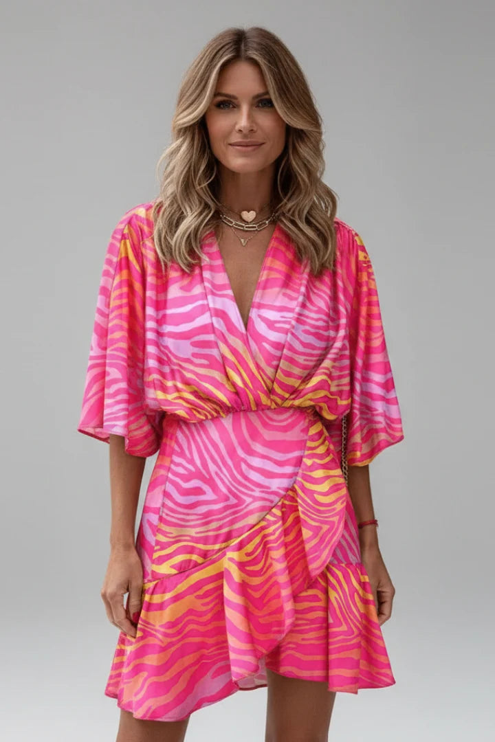 Flattering mini dress with wide batwing sleeves and adjustable waist tie in bold abstract print