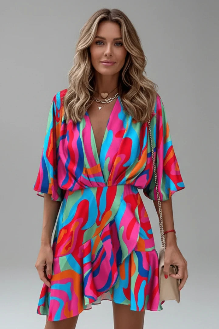 V-neck mini dress with flowing batwing sleeves and self-tie belt in colourful pattern