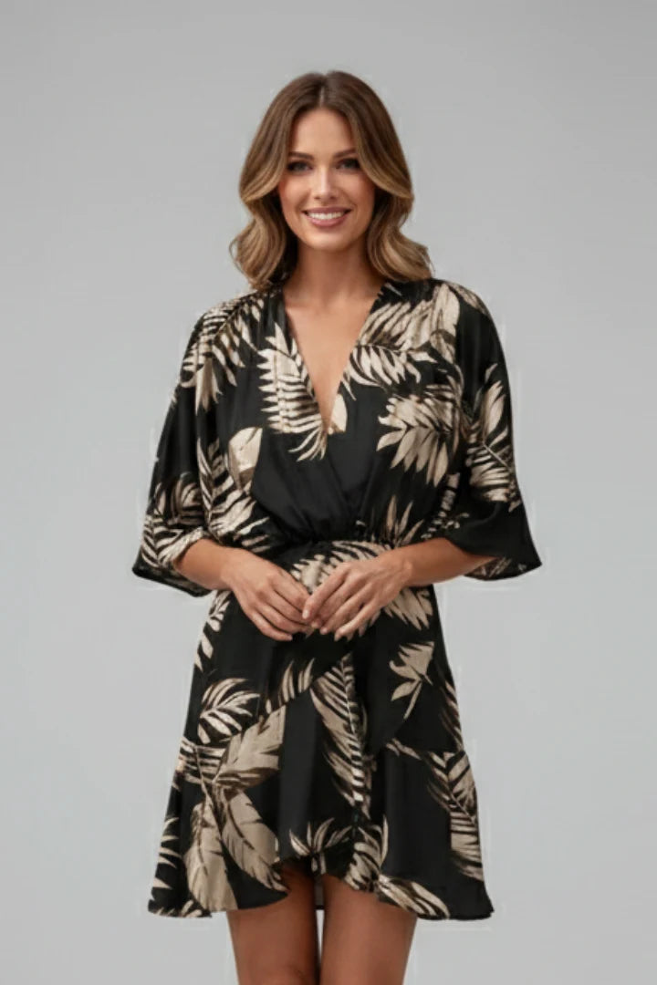 Above-knee length dress with relaxed batwing sleeves and cinched waist detail