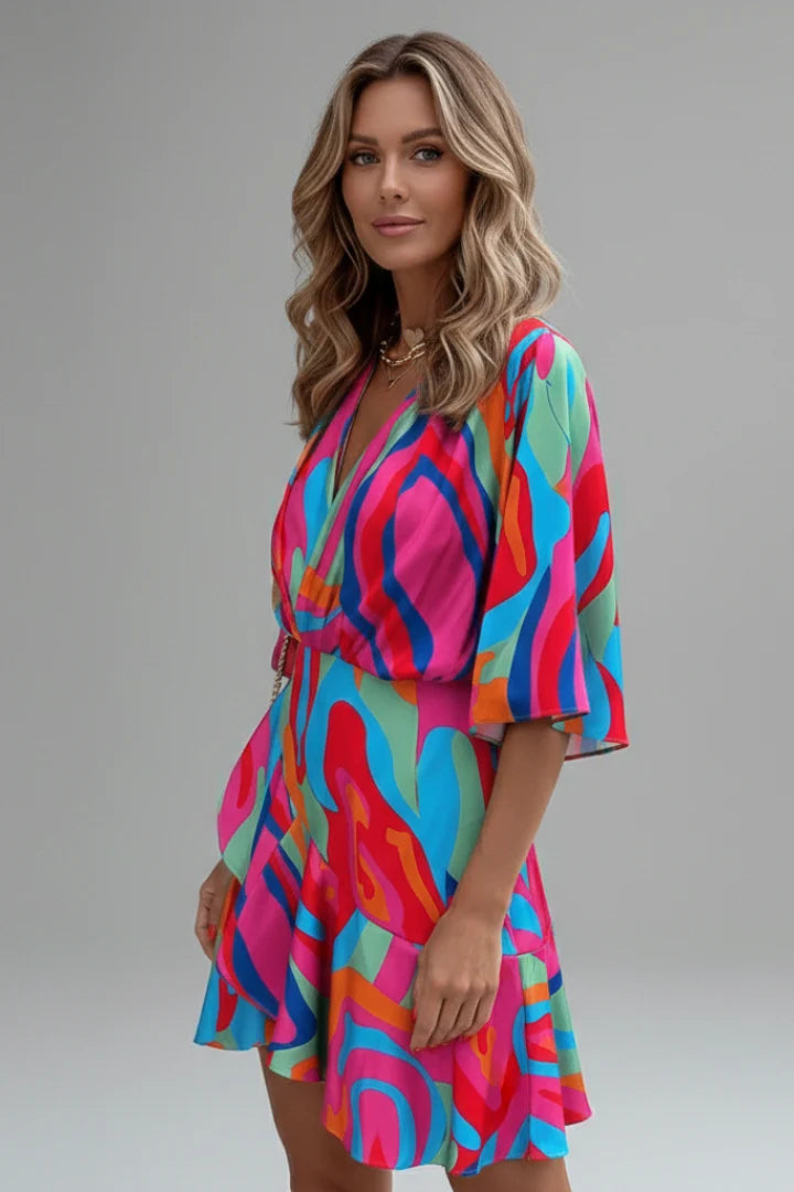 Women's mini dress with relaxed fit, batwing sleeves, and adjustable waist detail