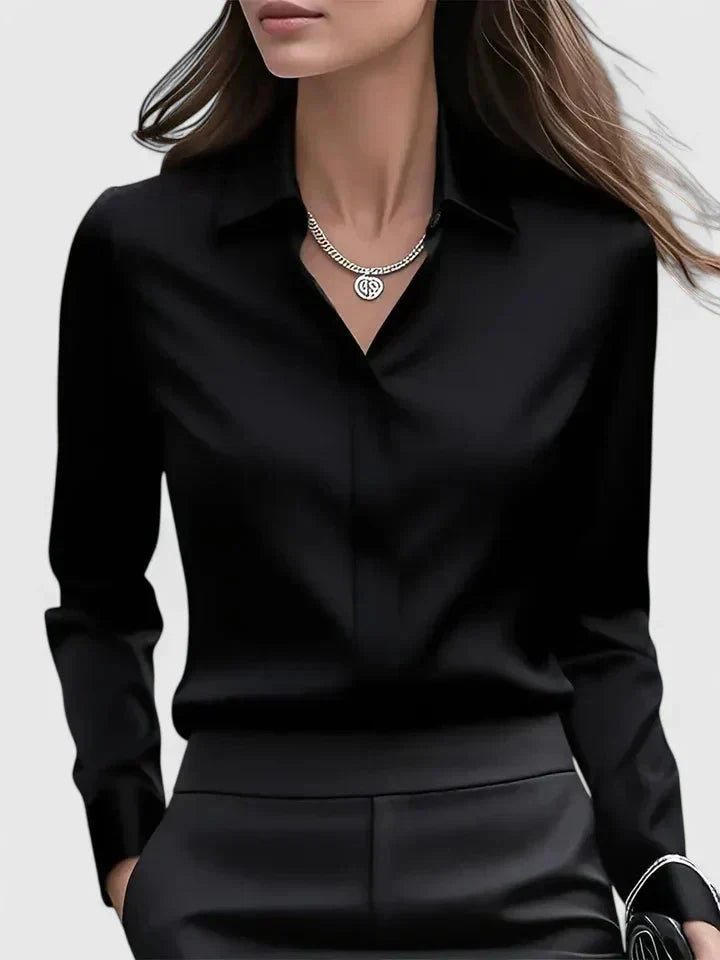 Full-length view of women's structured collar shirt with button-front closure and long sleeves