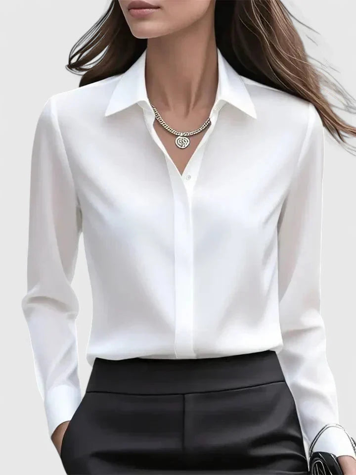 Women's navy tailored shirt styled open over camisole for casual weekend outfit