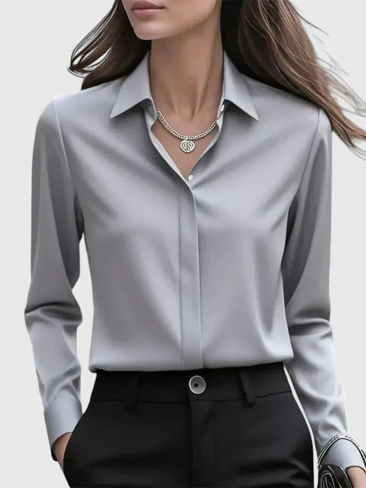 Women's long sleeve shirt in navy blue with pointed collar for corporate wardrobe