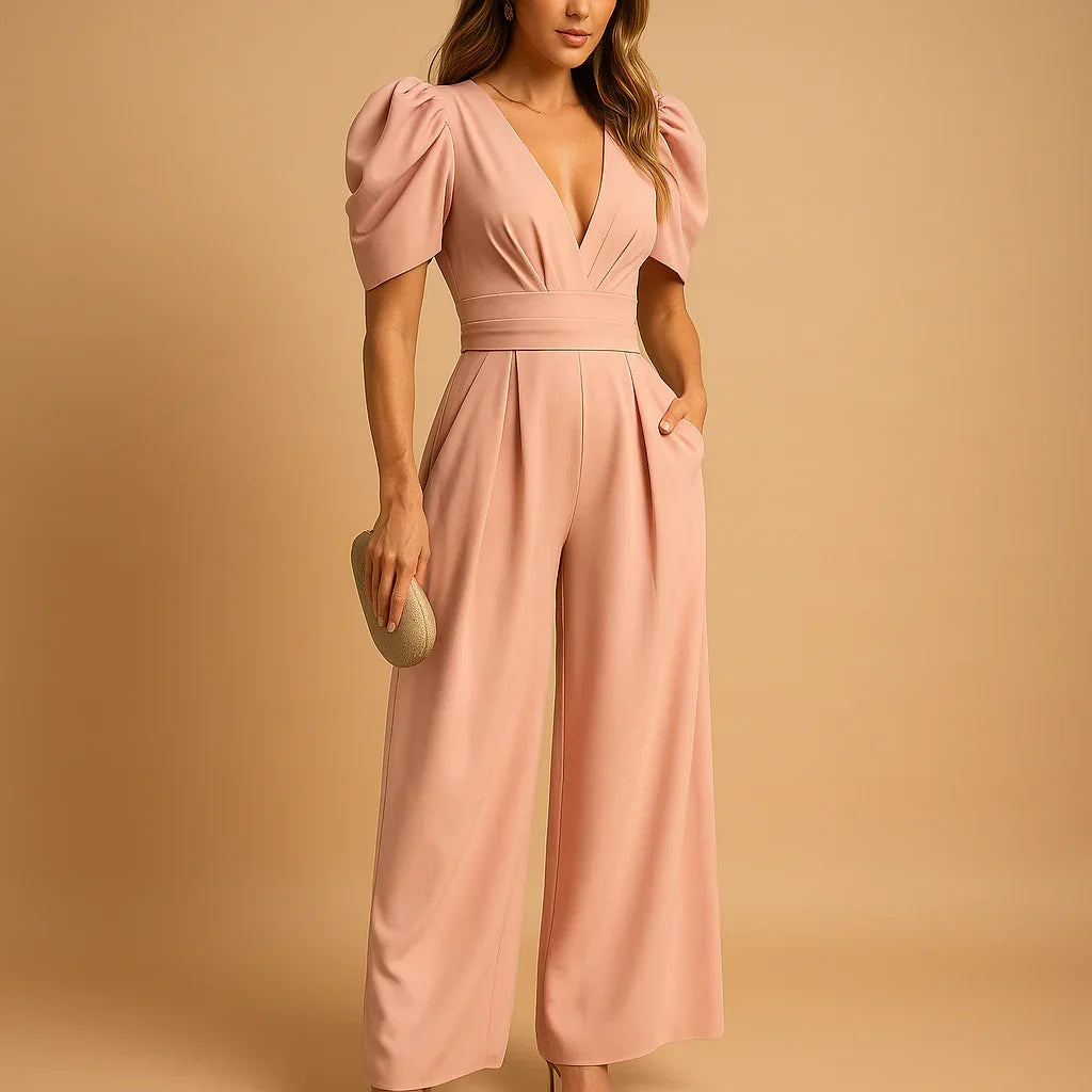 Peach puff sleeve wide leg jumpsuit with deep V-neckline and tailored waist detail for formal occasions