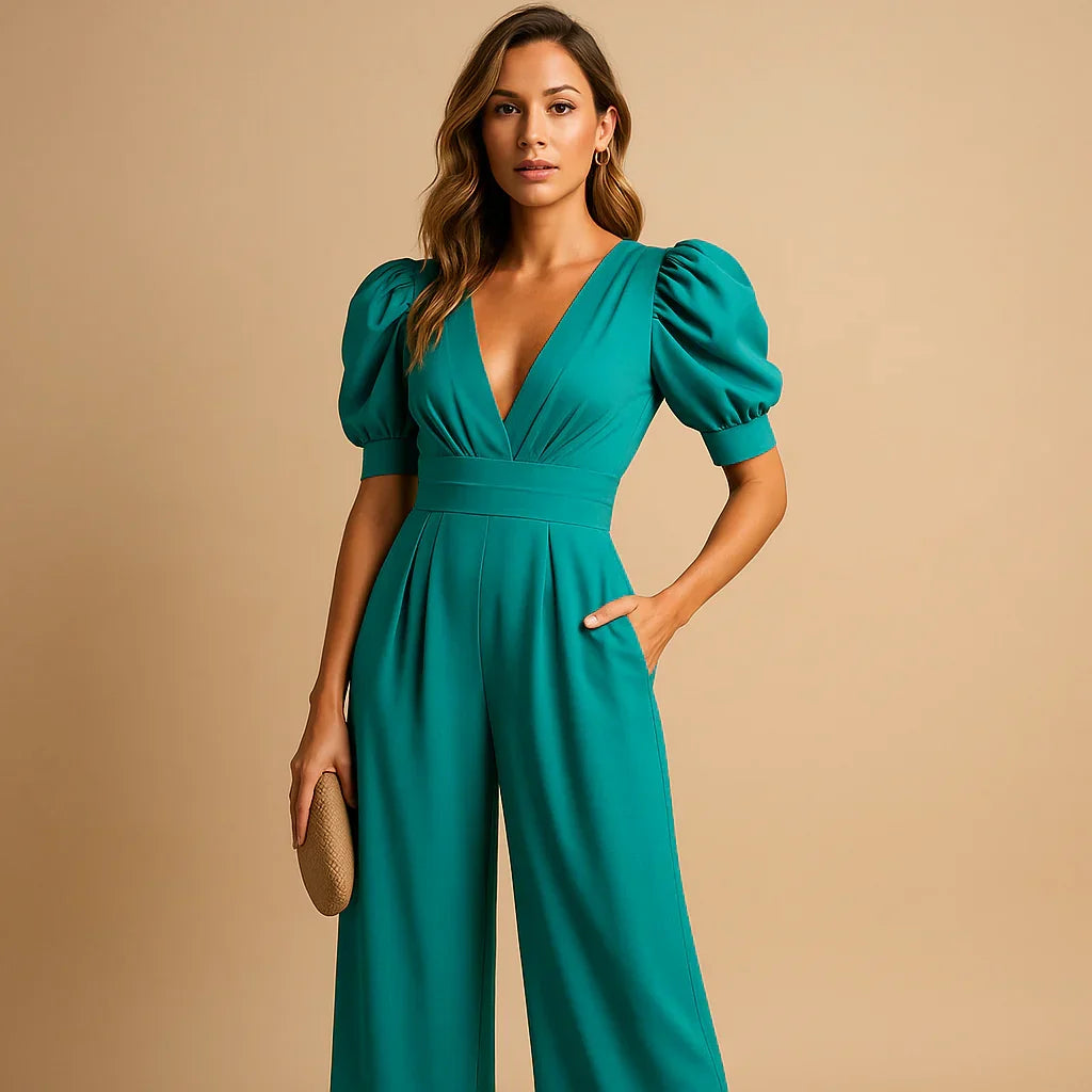 Full length view of wide leg jumpsuit with side pockets and smooth draping fabric