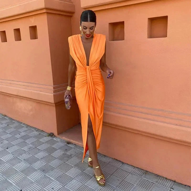 Close-up of gathered twist front detail on sleeveless midi dress with plunging neckline