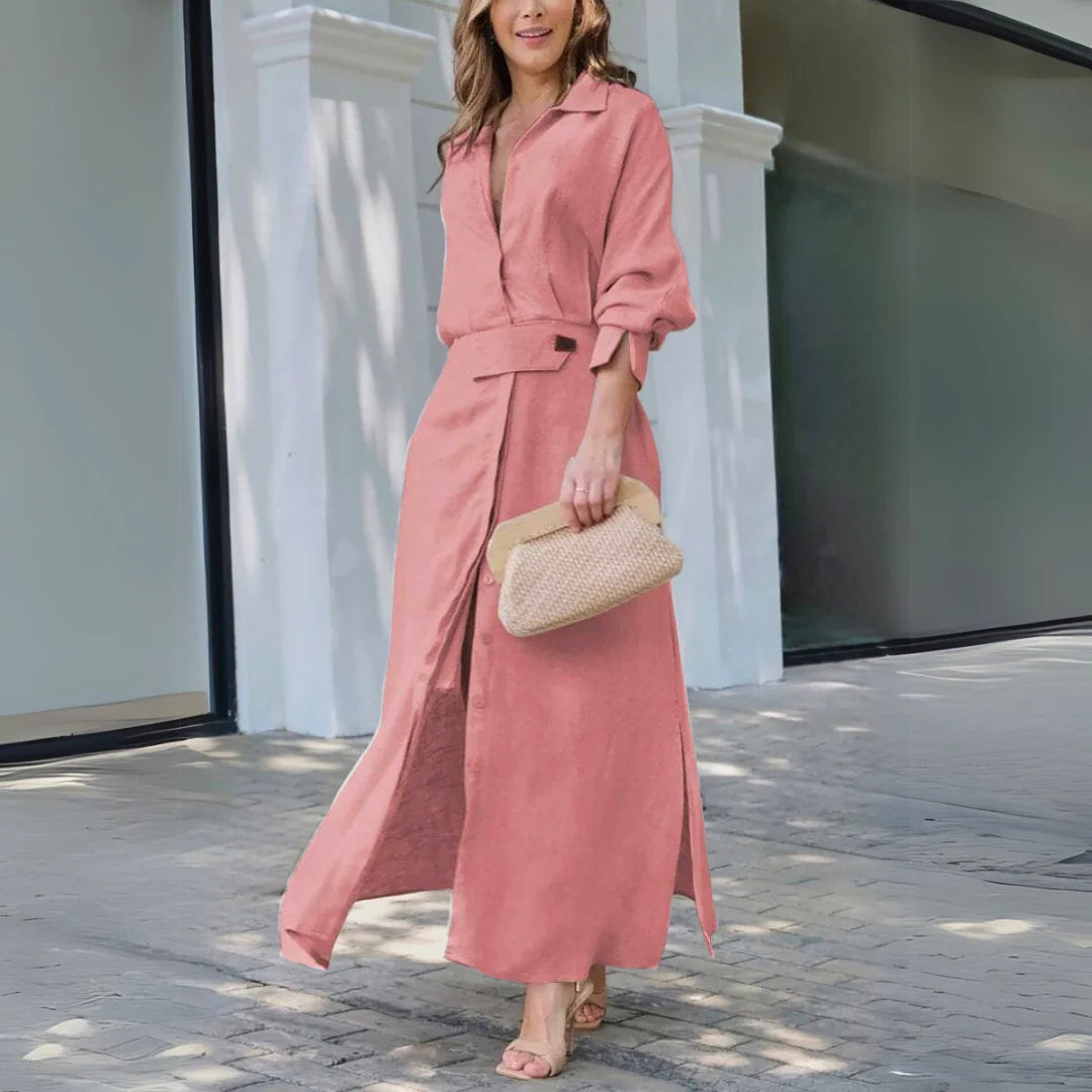 Close-up view of elegant maxi dress with V-neck showing flowing fabric and relaxed fit