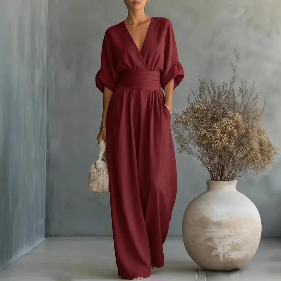 Women's linen jumpsuit styled with accessories showing versatile casual-to-smart look