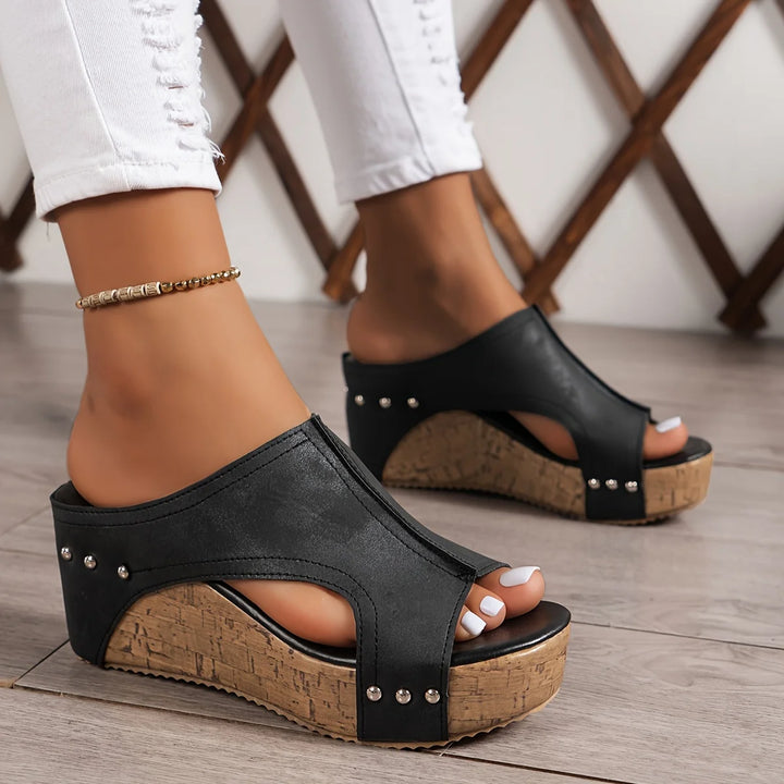 Women's platform wedge sandals with open-toe design and back strap for secure fit