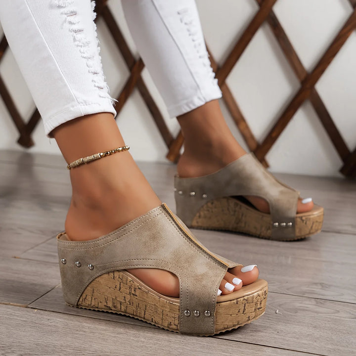 Cork wedge sandals in black with studded detail and smooth upper finish for casual style