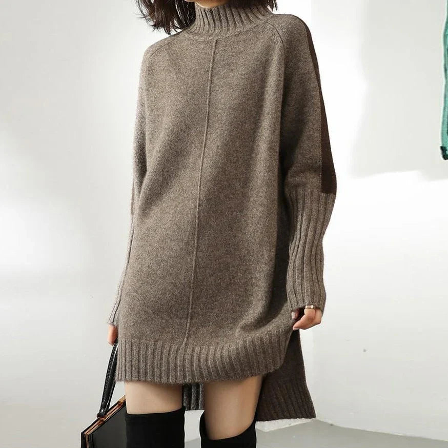 Women's knit jumper dress in taupe with turtle neck and ribbed cuffs, styled with knee-high boots