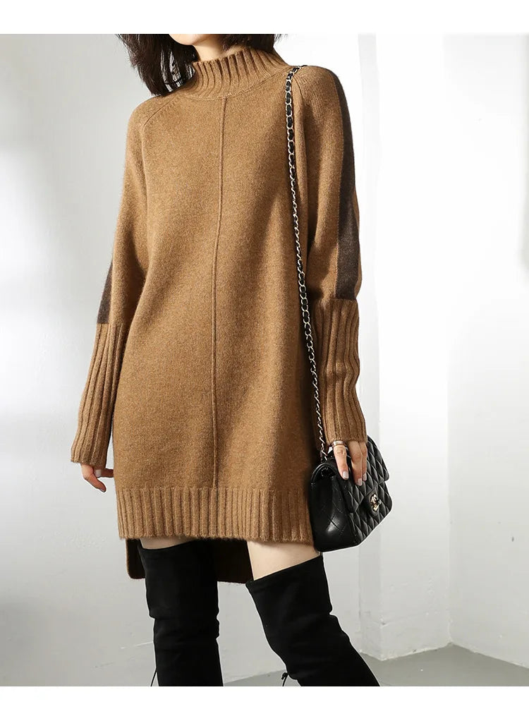 Back view of oversized knit jumper dress with ribbed hem and turtle neck collar