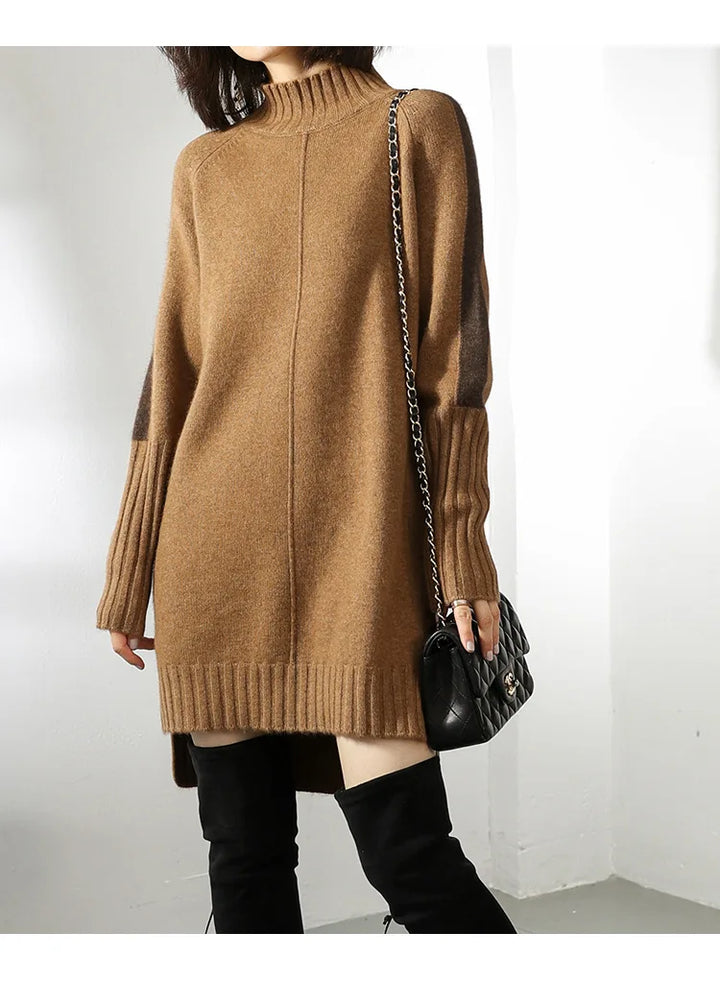 Back view of oversized knit jumper dress with ribbed hem and turtle neck collar