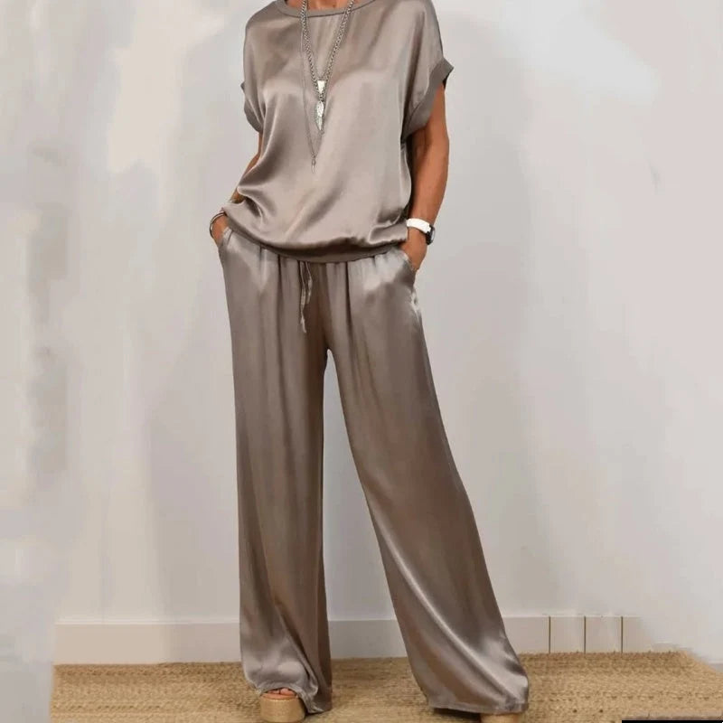 Close-up detail of drawstring waist and smooth fabric finish on women's two-piece set