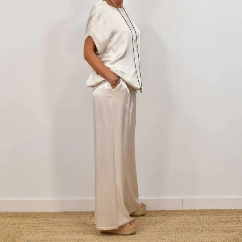 Women's loose fit two-piece set styled with platform sandals for casual everyday wear