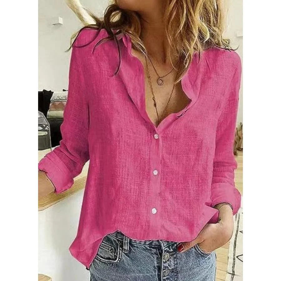 Relaxed fit long sleeve shirt featuring soft woven fabric and rolled sleeves for casual styling