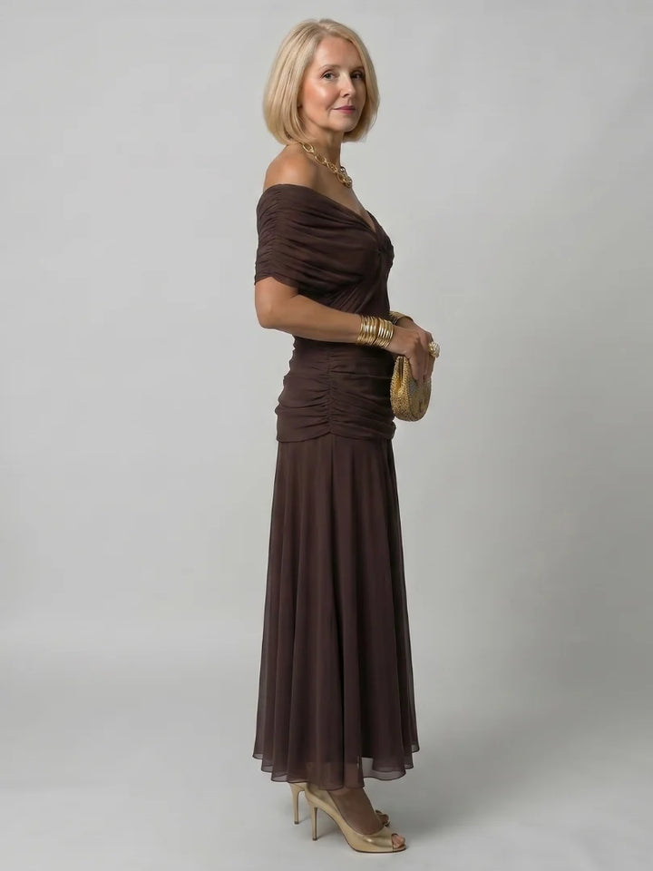 Off-shoulder formal dress with full-length skirt and ruched waist detail