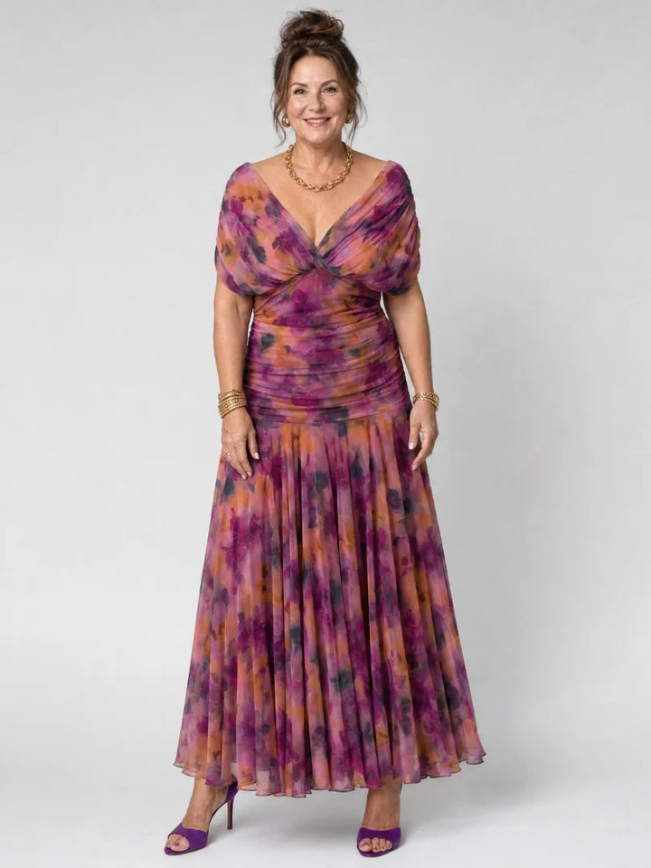 Back angle of off-shoulder dress with gathered waist and ankle-length hem
