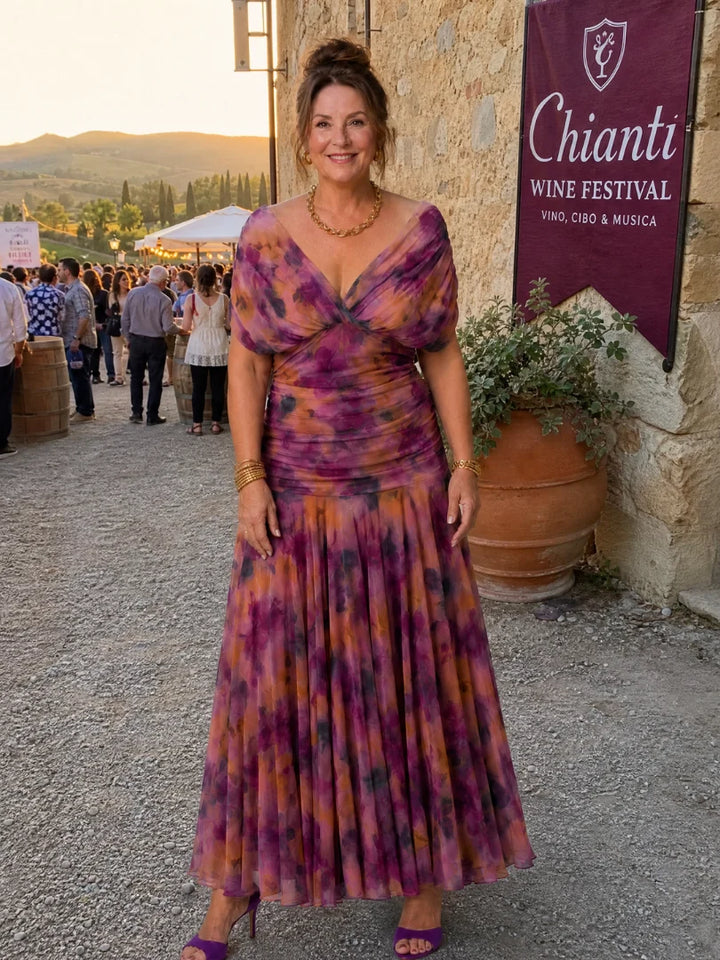 Floral maxi dress styled for formal events with draped neckline and A-line skirt