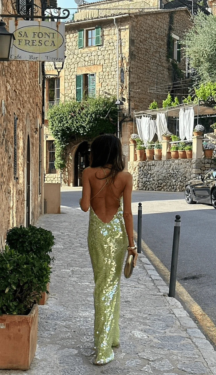Back view of chartreuse sequin maxi dress with adjustable spaghetti straps and figure-flattering fit