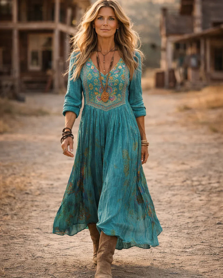 Close-up view of intricate embroidered bodice on Women's Embroidered V Neck Maxi Dress