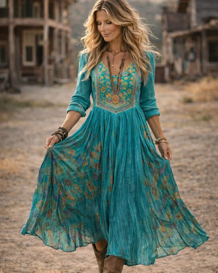 Detail of V neckline and embroidered patterns on Women's Embroidered V Neck Maxi Dress