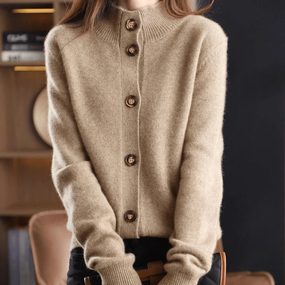 Full-length view of women's flowing knit cardigan with button closure and structured ribbing