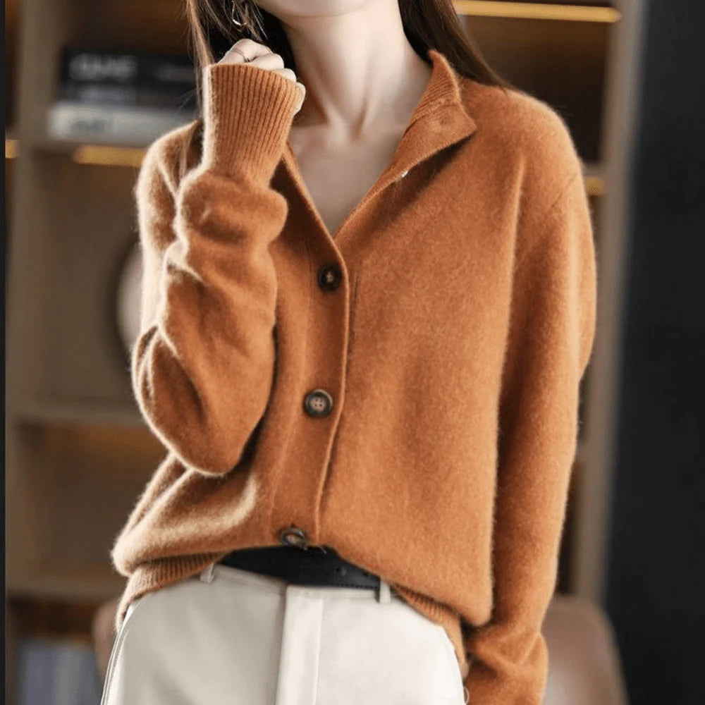 Women's knit cardigan in camel brown demonstrating relaxed fit and smooth knit finish