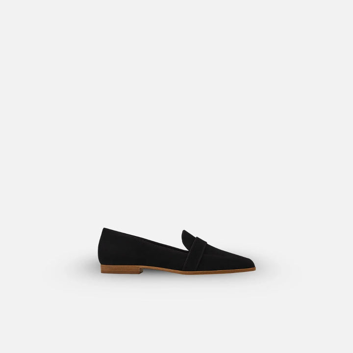 Harper women's loafers in black with pointed toe and low stacked heel on neutral background