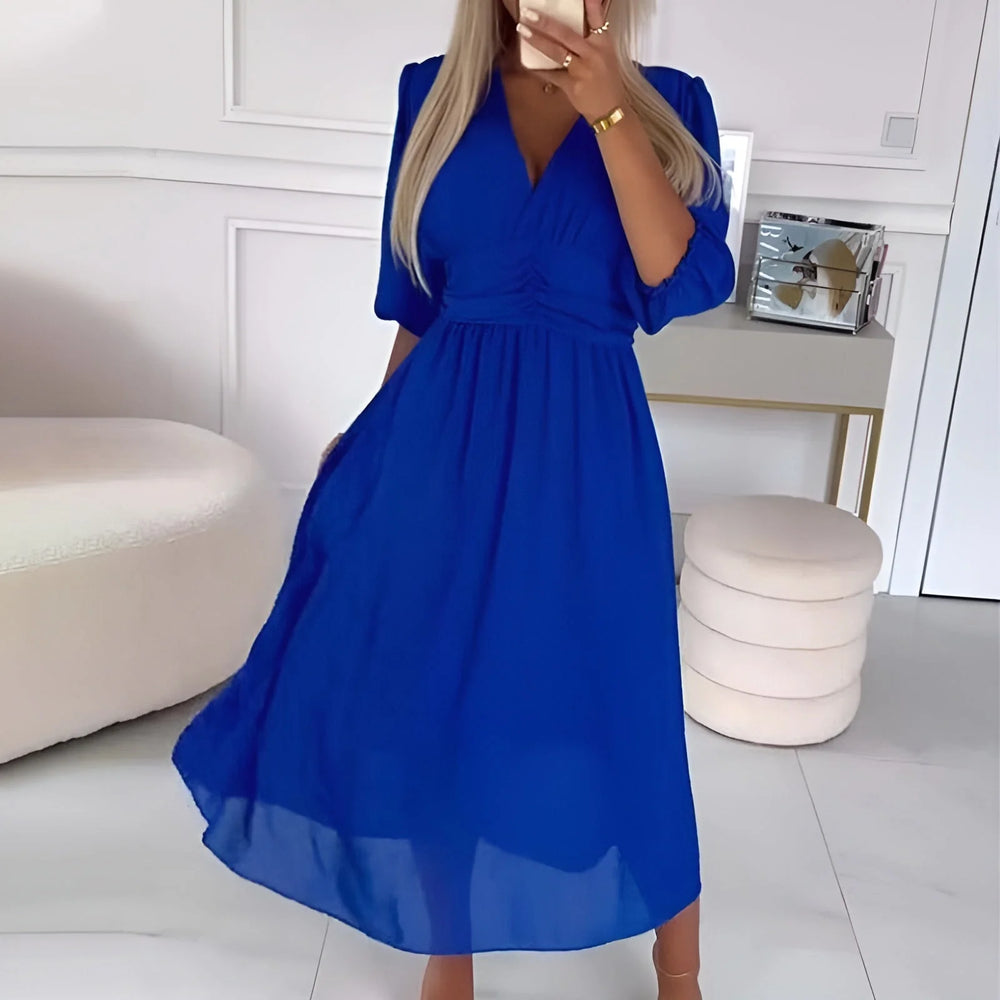 Side view of Women's V-Neck A-Line Midi Dress showing flowing A-line silhouette
