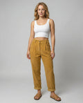 Elastic waist corduroy trousers in mustard yellow with high-rise fit and relaxed straight-leg silhouette for women