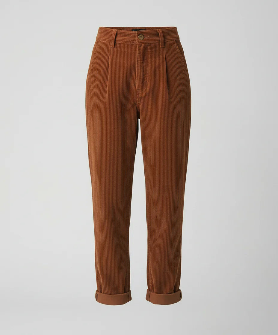 Detail shot of corduroy ribbed texture and pleated front on casual trousers