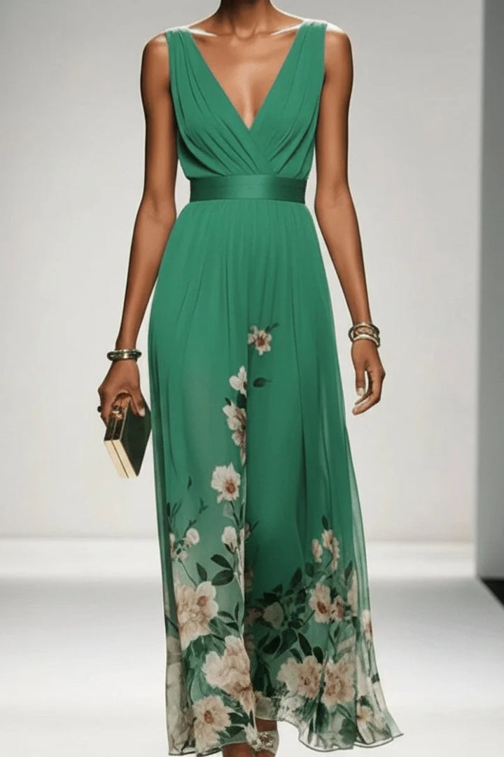Back view of women's floral evening gown showing A-line silhouette and chiffon fabric movement
