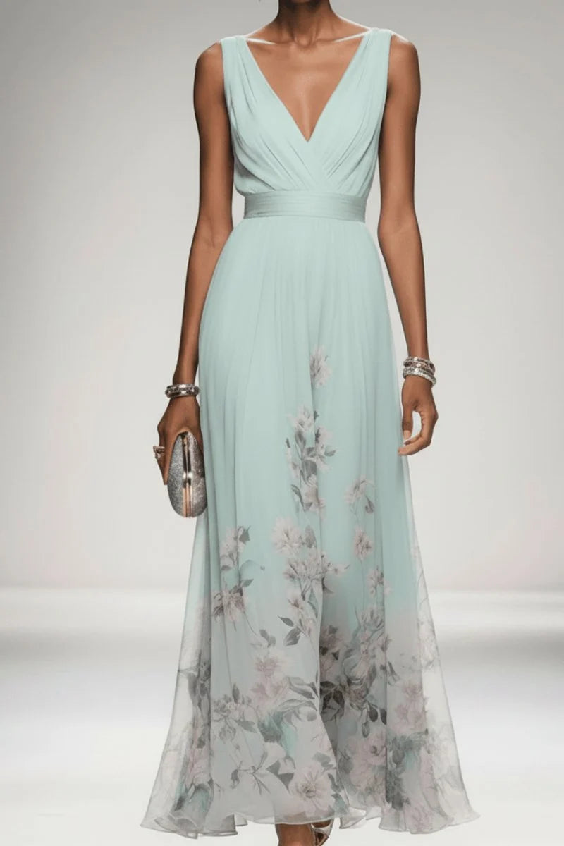 Side profile of chiffon evening gown showing flowing A-line skirt and sleeveless design