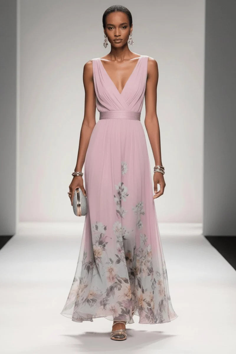 Close-up of empire waist gathering and V-neckline on floral chiffon evening gown