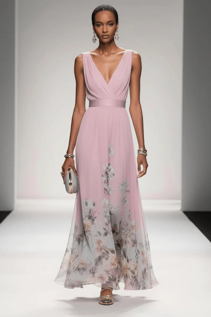 Close-up of empire waist gathering and V-neckline on floral chiffon evening gown