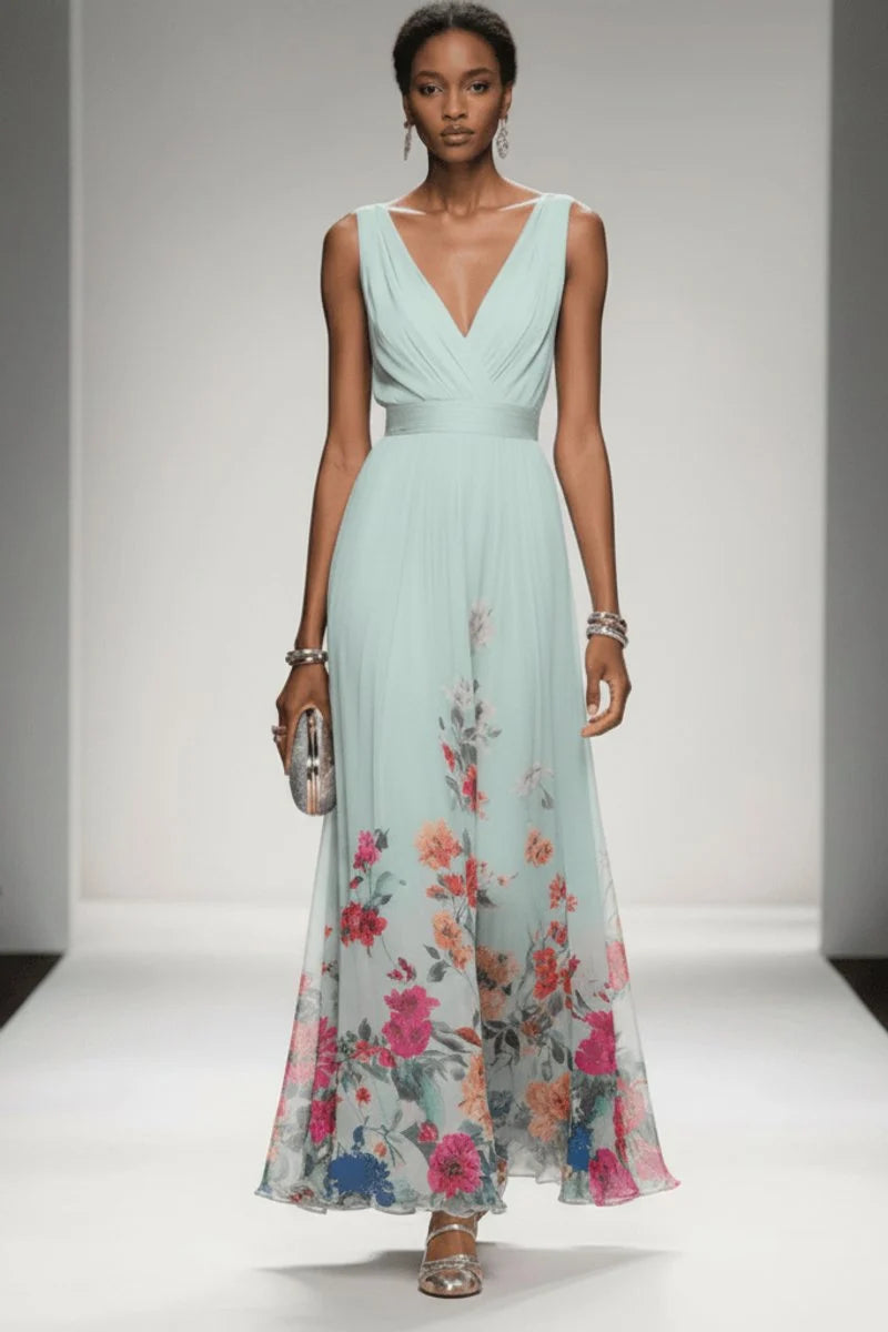 Floral chiffon maxi dress showing flowing A-line skirt and delicate watercolour print at hem